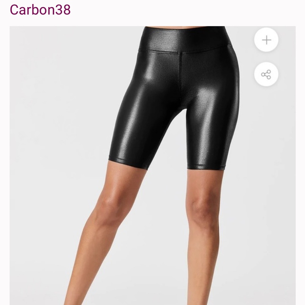 Carbon 38 shiny black bike shorts. Size large.